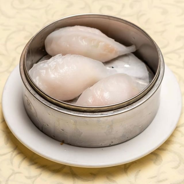 蒸蟹肉餃 [Crab Meat Shrimp Dumpling].